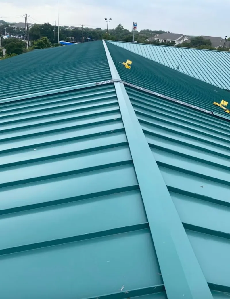 Green commercial metal roof ridge and valley for Metal Roof Repair in Herndon