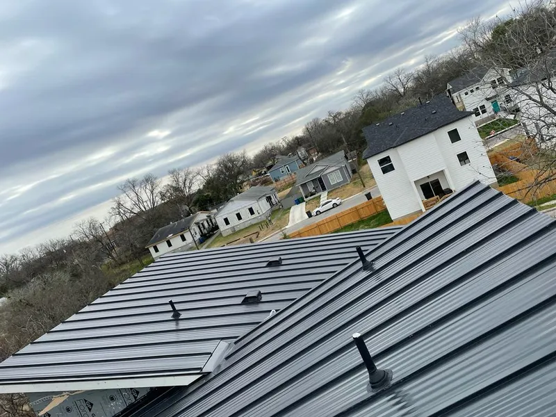 Standing seam metal roof panels with vents for Skylight Repair in Herndon